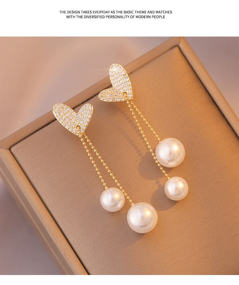 Light Extravagant Love Heart Niche Design Pearl Tassel Earrings