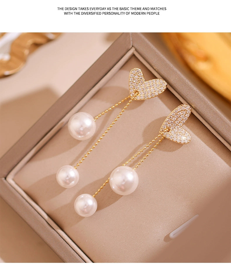 Light Extravagant Love Heart Niche Design Pearl Tassel Earrings